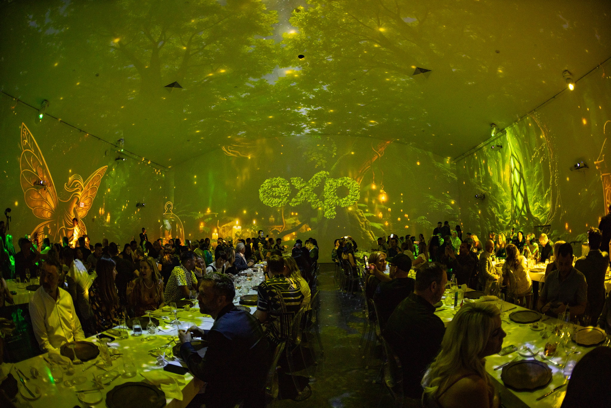 Awards dinner with green immersive lighting