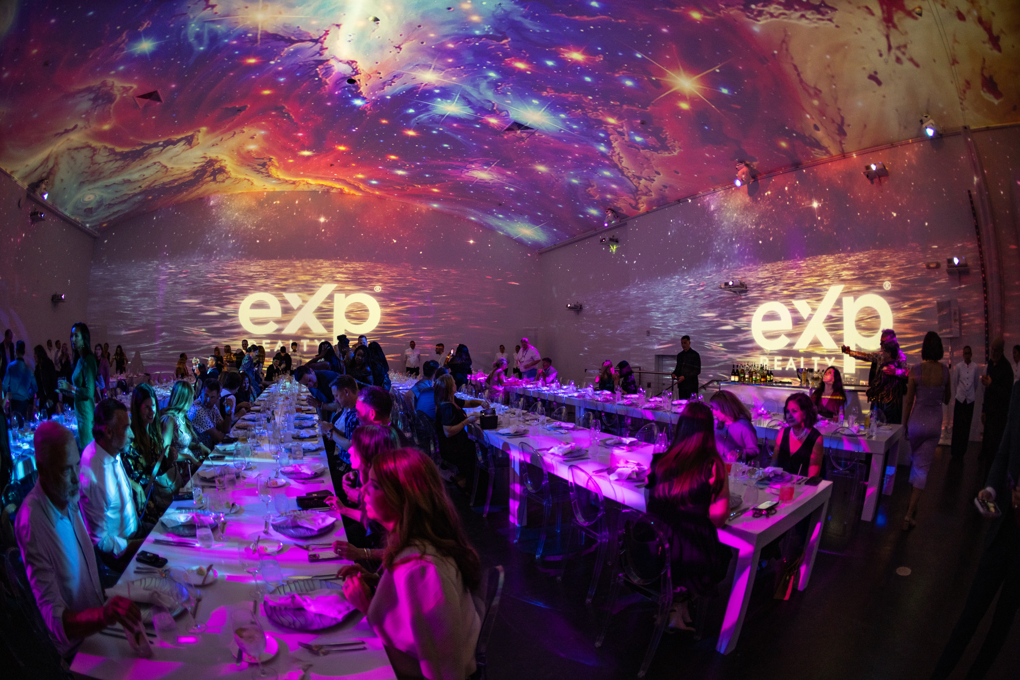 EXP Awards dinner with immersive galaxy projections