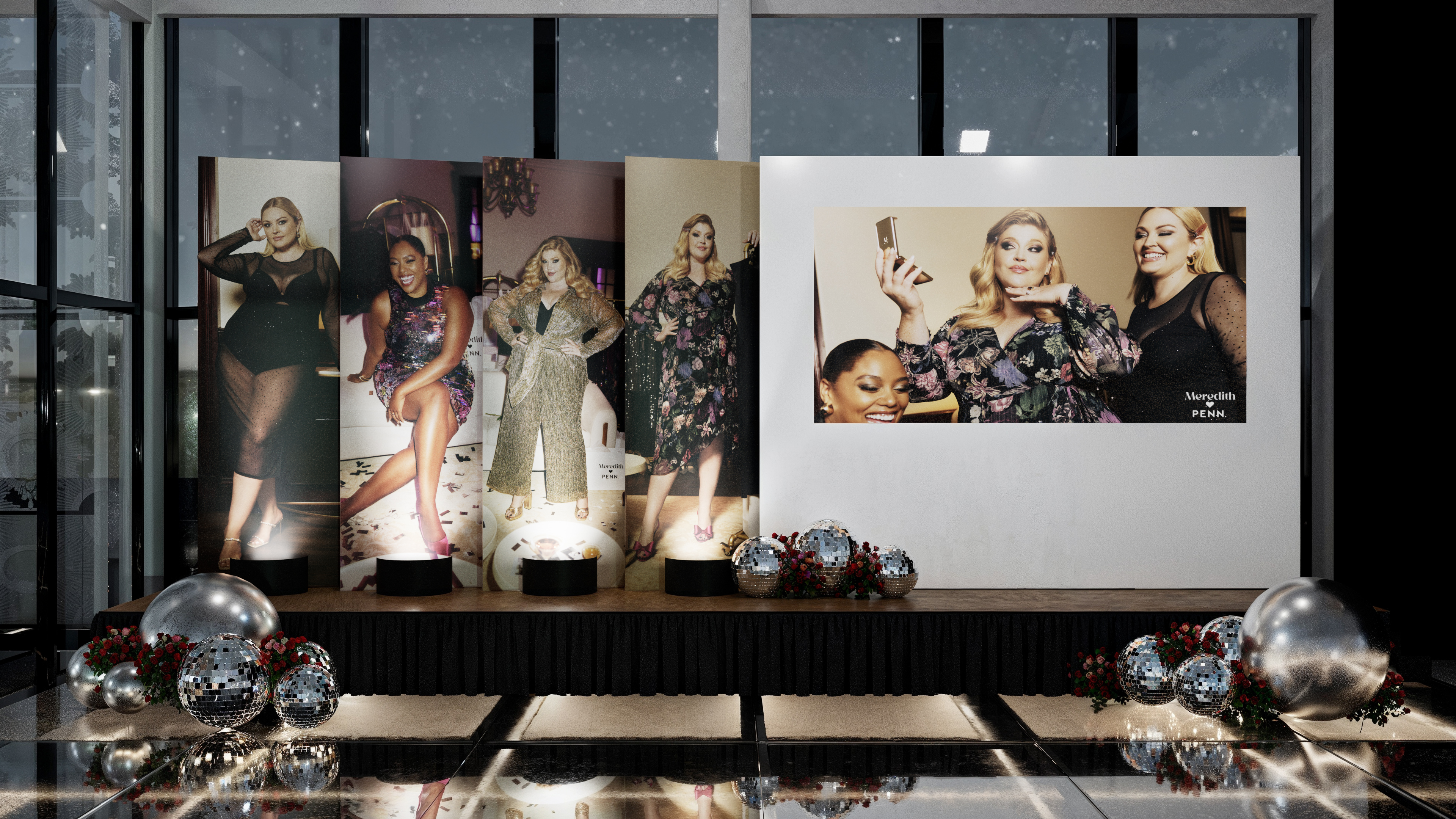 Meredith Penn event stage with illuminated portraits and mirrored decor